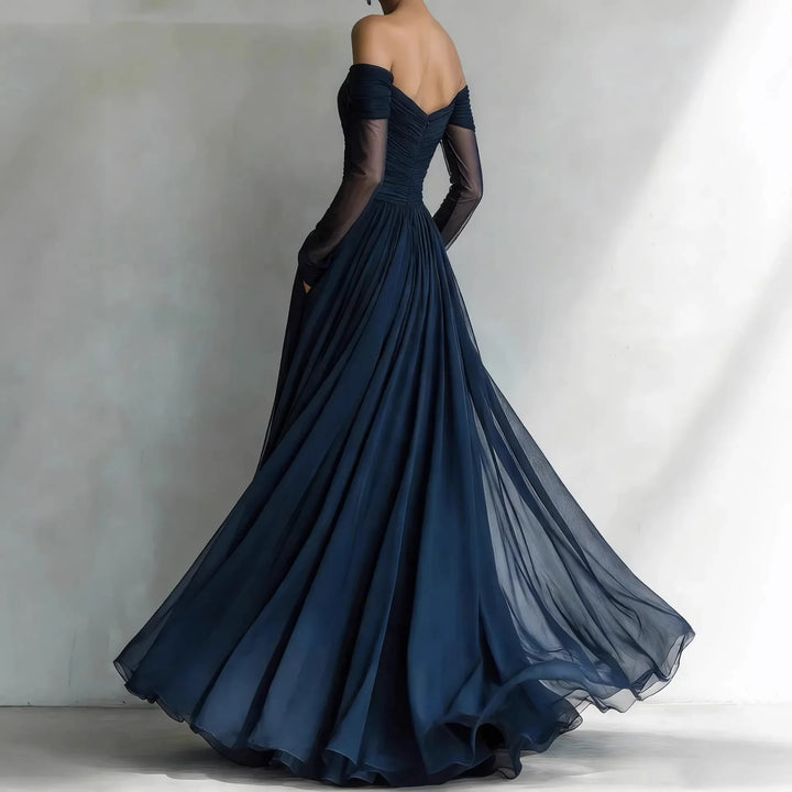 Scarlett | Navy tulle gown with off-shoulder sleeves and pleated skirt