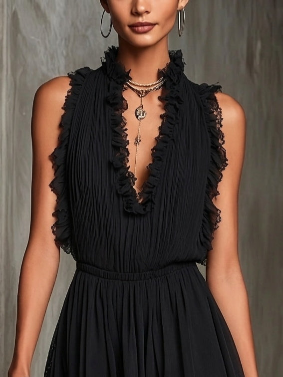 Flaminia | Black pleated playsuit with V-neck and lace edges