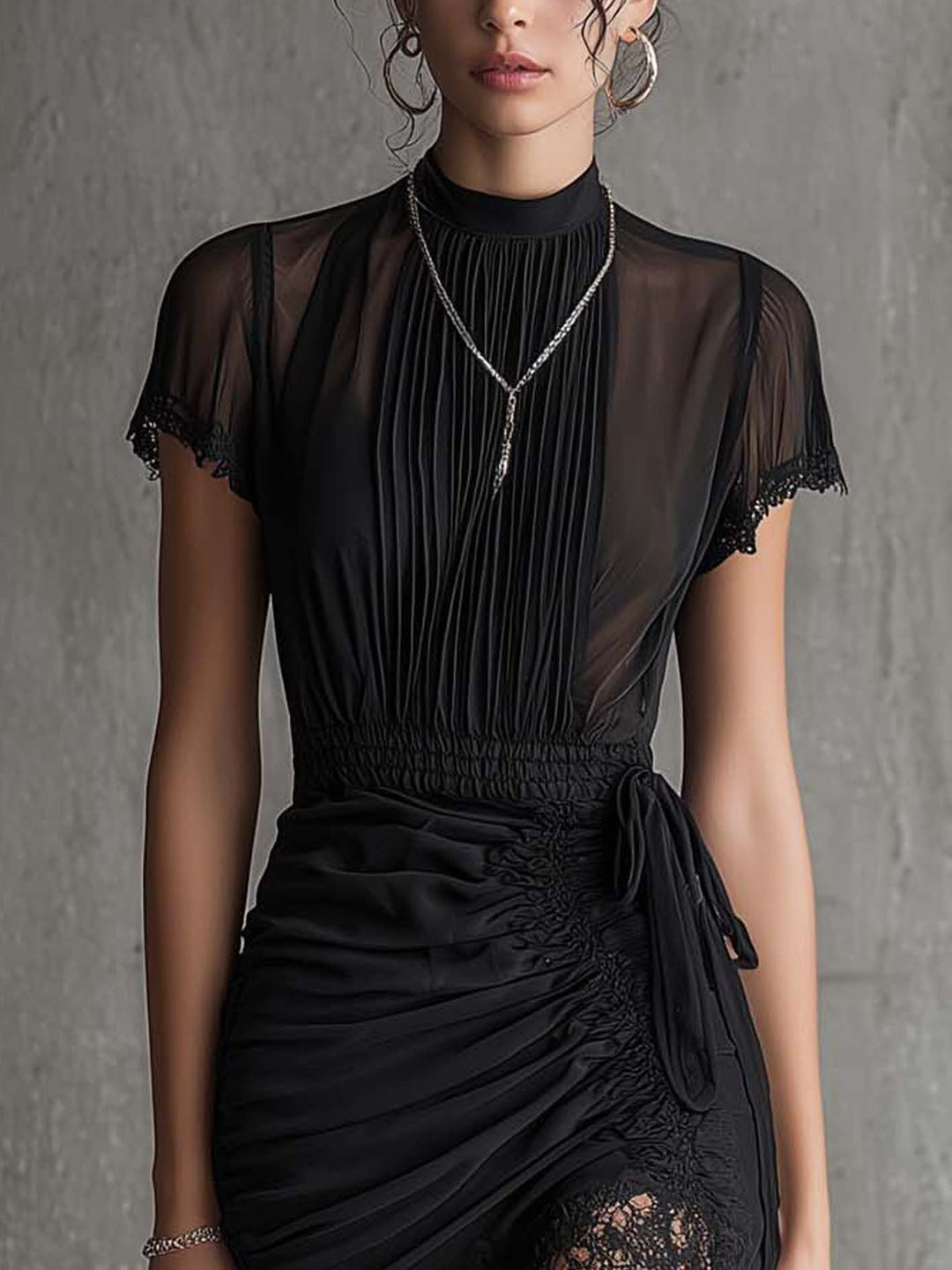 Barbara | Short black chiffon dress with pleats at the waist and lace trim
