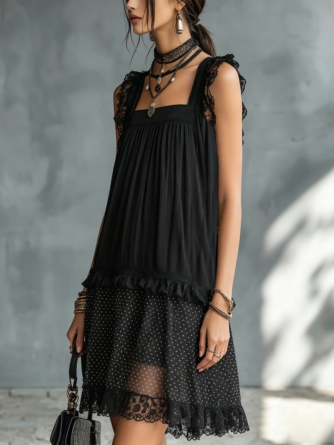 Myla | Black mini dress with transparent polka dots, lace trim, and ruffles