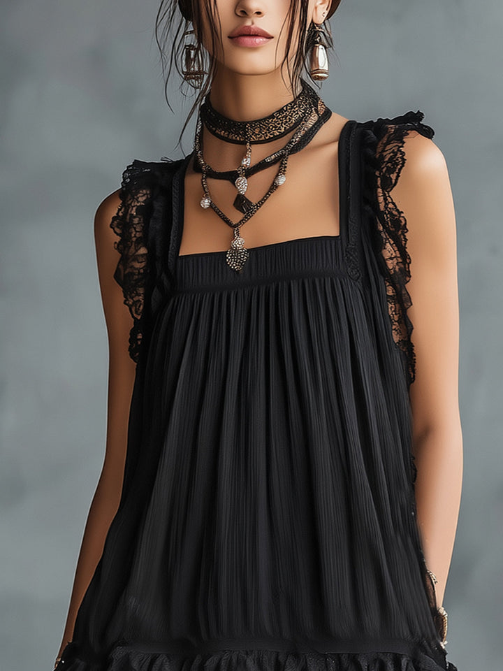 Myla | Black mini dress with transparent polka dots, lace trim, and ruffles