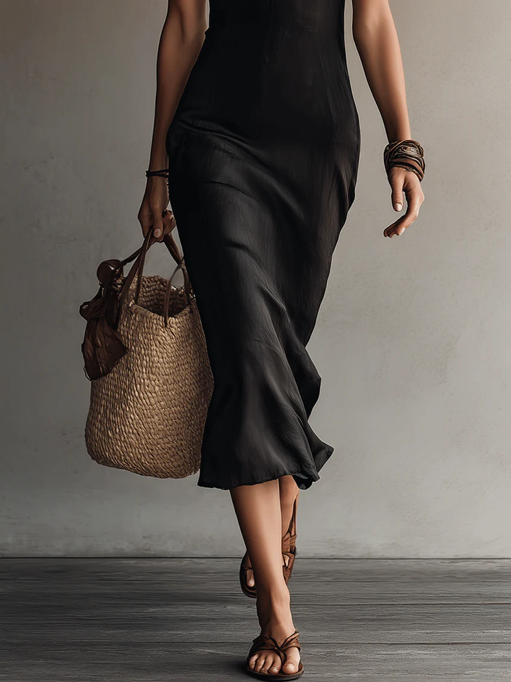 Adriana | Midi black sleeveless dress with V-neck and lace edges