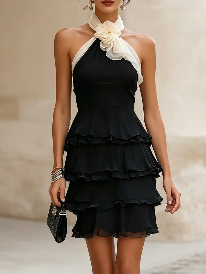 Nancy | Black layered mini dress in chiffon with floral pattern and halterneck neckline